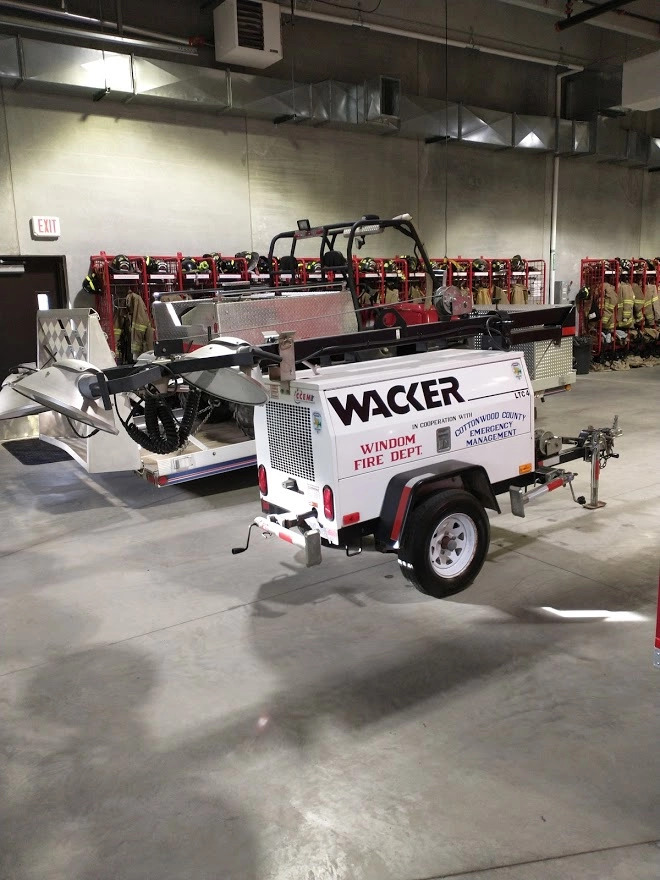 Light Tower - Obtained with a Joint Project with the Cottonwood County Emergency Management and the Windom Fire Dept. Equipped with 4-1000 Watt Light Bulbs, Will raise up to 30 ft. in the air and will light up a 5 to 7 acres area.